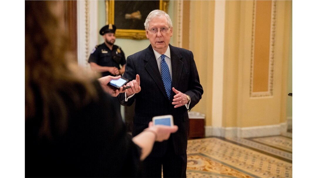 Senate Majority Leader Mitch McConnell of Ky. speaks to reporters outside the Senate chamber after Democrats block a coronavirus aid package on Capitol Hill, Monday, March 23, 2020, in Washington.