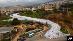 A general view shows packed garbage bags on a street in Jdeideh, east Beirut, Lebanon, March 3, 2016.