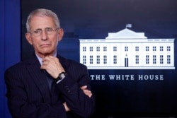 FILE - Anthony Fauci, director of the National Institute of Allergy and Infectious Diseases, is seen at the White House, in Washington, April 1, 2020.
