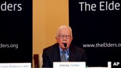 Former U.S. president Jimmy Carter speaks during news conference in Rangoon, Sept. 26, 2013.