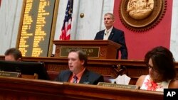 West Virginia House Speaker Pro Tempore John Overington presides over the start of a hearing, Aug. 13, 2018, at the Capitol in Charleston, W. Va. The House of Delegates was considering the impeachment of the entire state Supreme Court in a scandal over $3.2 million in office renovations. 