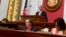 West Virginia House Speaker Pro Tempore John Overington presides over the start of a hearing, Aug. 13, 2018, at the Capitol in Charleston, W. Va. The House of Delegates was considering the impeachment of the entire state Supreme Court in a scandal over $3.2 million in office renovations. 