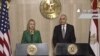 اعلام برقراری آتش بس توسط وزیر امور خارجه مصر (راست) با همراهی وزیر امور خارجه آمریکا