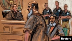 FILE - Adel Abdul Bary, seated, is seen with fellow terror suspect Khalid al-Fawwaz in this sketch made during an appearance in Manhattan Federal Court in New York, Oct. 6, 2012.