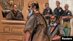 FILE - Adel Abdul Bary, seated, is seen with fellow terror suspect Khalid al-Fawwaz in this sketch made during an appearance in Manhattan Federal Court in New York, Oct. 6, 2012.