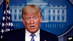 President Donald Trump speaks about the coronavirus in the James Brady Briefing Room, Monday, March 23, 2020, in Washington. (AP Photo/Alex Brandon)