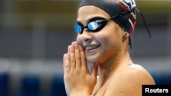 Perenang tim pengungsi Suriah, Yusra Mardini, 18, berlatih di kolam Olimpiade di Rio de Janeiro, Brazil, Januari 2016.