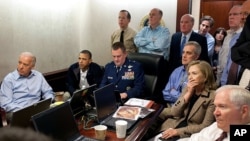 FILE - President Barack Obama and Vice President Joe Biden, along with with members of the national security team, receive an update on the mission against Osama bin Laden in the Situation Room of the White House, May 1, 2011. (AP/The White House)