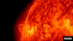NASA's Solar Dynamics Observatory captured this image of the X1.2 class solar flare on May 14, 2013. The image show light with a wavelength of 304 angstroms. Credit: NASA/SDO