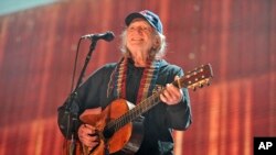 FILE - In this Sept. 19, 2015 file photo, Willie Nelson performs at Farm Aid 30 at FirstMerit Bank Pavilion at Northerly Island in Chicago. 