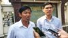 Uon Chhin and Yeang Sotheatin, former Radio Free Asia journalists talk to reporters in front of the Appeals Court in Phnom Penh, Monday, January 20, 2020. (Kann Vicheika/VOA Khmer) 