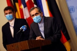 Iran's U.N. Ambassador Majid Takht Ravanchi speaks to reporters at U.N. headquarters in New York, Aug. 20, 2020.