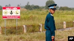 A Vietnamese soldier stands guard at the dioxin contaminated area while U.S. Defense Secretary Jim Mattis visits Bien Hoa air base in Bien Hoa, outside Ho Chi Minh City, Vietnam, Oct. 17, 2018.