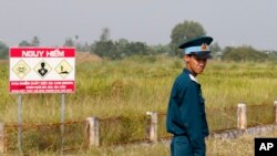 A Vietnamese soldier stands guard at the dioxin contaminated area while U.S. Defense Secretary Jim Mattis visits Bien Hoa air base in Bien Hoa, outside Ho Chi Minh City, Vietnam, Oct. 17, 2018.