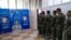 FILE - Kurdish Peshmerga soldiers take part in a voting simulation to test the efficiency of the system and the tools, ahead of Kurdistan parliamentary elections scheduled for October 2024, in Irbil on Aug. 29, 2024.