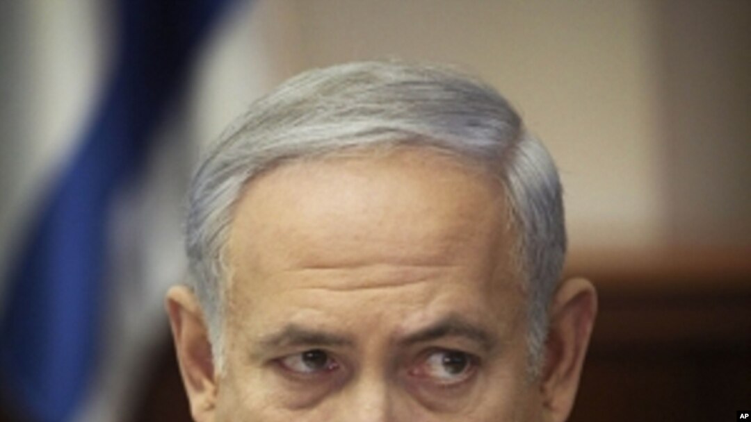 Israeli Prime Minister Benjamin Netanyahu talks during a weekly cabinet meeting in Jerusalem, Sunday, Sept. 18, 2011