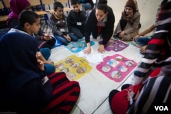 Children playing games organized as part of the "Syria in my Mind" project, which was set up by an NGO named Biladi, Dec. 3, 2015. (J. Owens/VOA)