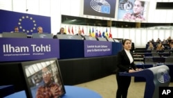 Jewher Ilham, daughter of imprisoned Uighur scholar Ilham Tohti speaks during the Sakharov Prize ceremony at the European Parliament, in Strasbourg, eastern France, Dec. 18, 2019. 
