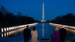 President-elect Joe Biden and his wife Jill Biden are joined by Vice President-elect Kamala Harris and her husband Doug Emhoff in a COVID-19 memorial event at the Lincoln Memorial Reflecting Pool, in Washington, Jan. 19, 2021.
