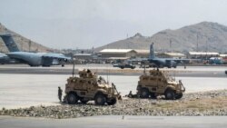U.S. Army soldiers assigned to the 82nd Airborne Division patrol Hamid Karzai International Airport in Kabul, Afghanistan, August 17, 2021. (U.S. Air Force/Senior Airman Taylor Crul/Handout via Reuters)