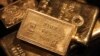 Gold Prices Fall to Five-year Low in Asia Trading