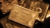 Gold Prices Fall to Five-year Low in Asia Trading