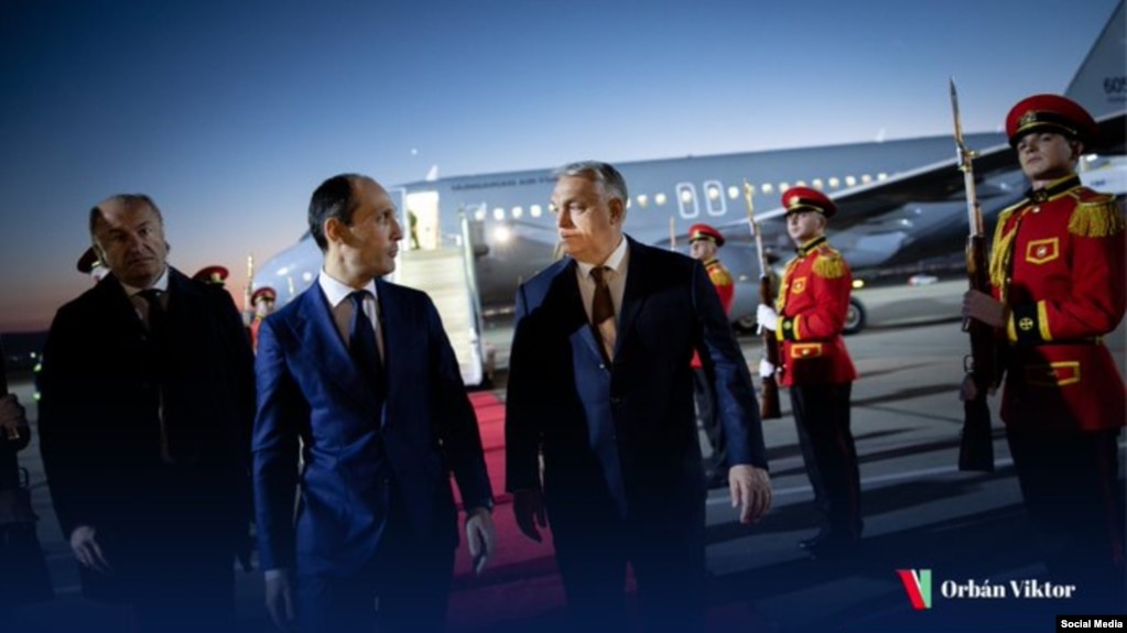 In a photo posted on his X feed on Oct. 28, 2024, Hungarian Prime Minister Viktor Orban, center-right, is seen arriving in Tbilisi, Georgia.