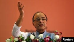 India's Finance Minister Arun Jaitley addresses a gathering during a seminar on 'Income Declaration Scheme-2016' in Ahmedabad, July 10, 2016.