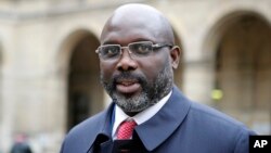 Le président du Libéria, George Weah, à Paris, 20 février 2018.