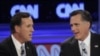 Rick Santorum, à esquerda na foto, com Mitt Romney: uma rivalidade declarada.