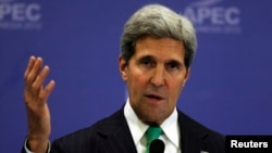 U.S. Secretary of State John Kerry gestures during a news conference at the Asia Pacific Economic Cooperation (APEC) ministerial meeting in Nusa Dua, Bali island Oct. 5, 2013. 