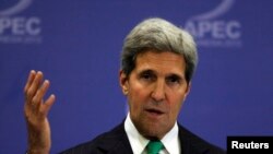 U.S. Secretary of State John Kerry gestures during a news conference at the Asia Pacific Economic Cooperation (APEC) ministerial meeting in Nusa Dua, Bali island Oct. 5, 2013.