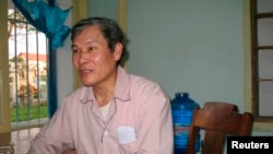 ကက္သလစ္ ဘုန္းေတာ္ႀကီး Nguyen Van Ly ကို ၂၀၁၀ ျပည့္ႏွစ္က ရိုက္ကူးထားေသာ ဓါတ္ပံု။ (REUTERS/Emanuel Nguyen Vinh Gioang)