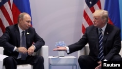 U.S. President Donald Trump meets with Russian President Vladimir Putin during their bilateral meeting at the G20 summit in Hamburg, Germany, July 7, 2017.