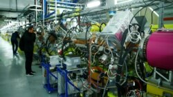 People visit the new linear accelerator Linac 4, the newest accelerator acquisition since the Large Hadron Collider (LHC), which is due to feed the CERN accelerator complex with particle beams of higher energy, during its inauguration at the European Orga