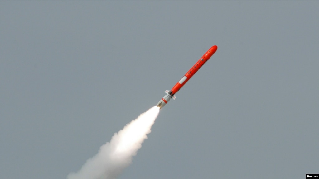 FILE - Pakistan's Babur Hatf VII cruise missile takes off during a test flight from an undisclosed location, July 26, 2007. 