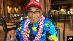 In this Dec. 5, 2016 photo, Ray Chavez, a Pearl Harbor survivor from Poway, California, pauses while eating breakfast in Honolulu.