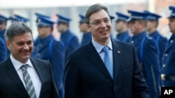  Serbia's Prime Minister Aleksandar Vucic (R), accompanied by Bosnian Prime Minister Denis Zvizdic, inspect the honor guard during an official welcoming ceremony in Sarajevo, Bosnia, Nov. 4, 2015.