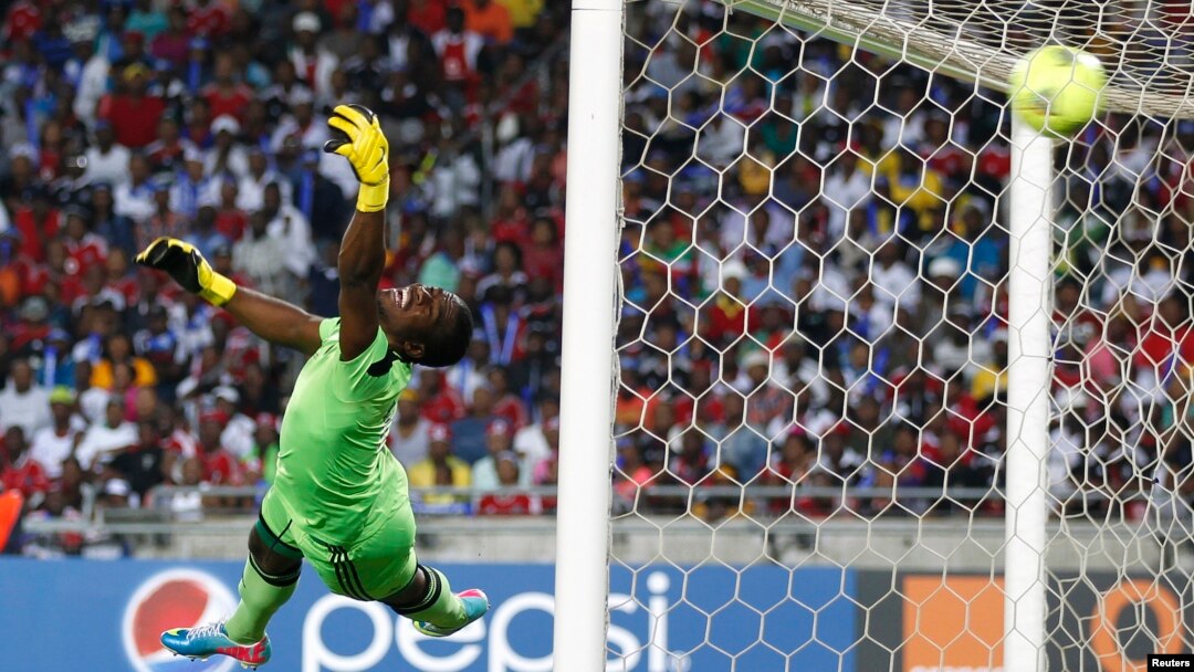 FILE - Senzo Meyiwa is seen during a match at Orlando Stadium in Soweto Nov. 2, 2013.
