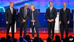 Democratic presidential candidates, from left, former Virginia Sen. Jim Webb, Sen. Bernie Sanders of Vermont, former Sec. of State Hillary Clinton, former Maryland Gov. Martin O'Malley and former Rhode Island Gov. Lincoln Chafee, take the stage before the debate in Las Vegas, Oct. 13, 2015.