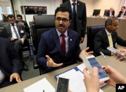 Mohammed Bin Saleh al-Sada, Minister of Energy and Industry of Qatar speaks to journalists prior to the start of a meeting of the Organization of the Petroleum Exporting Countries, OPEC, at their headquarters in Vienna, Austria, May 25, 2017.