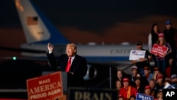 President Donald Trump speaks at a campaign rally at Minuteman Aviation Hangar, Oct. 18, 2018, in Missoula, Mont. 