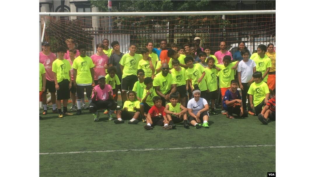 DC Scores group photo commemorating another day of soccer camp. (Photo by J. Nazar/VOA)