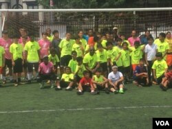 DC Scores group photo commemorating another day of soccer camp. (Photo by J. Nazar/VOA)