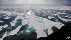 Sea ice melts on the Franklin Strait along the Northwest Passage in the Canadian Arctic Archipelago, July 22, 2017. (AP Photo/David Goldman)