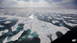 Sea ice melts on the Franklin Strait along the Northwest Passage in the Canadian Arctic Archipelago, July 22, 2017. Because of climate change, more sea ice is being lost each summer than is being replenished in winters. Less sea ice coverage also means th