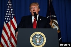 FILE - U.S. President Donald Trump delivers a statement about missile strikes on a Syrian airbase, at his Mar-a-Lago estate in West Palm Beach, Fla., April 6, 2017.