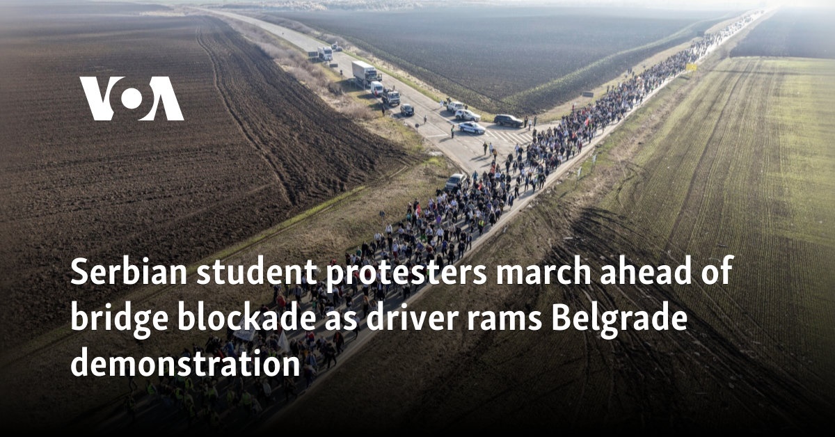 Serbian student protesters march ahead of bridge blockade as driver rams Belgrade demonstration 