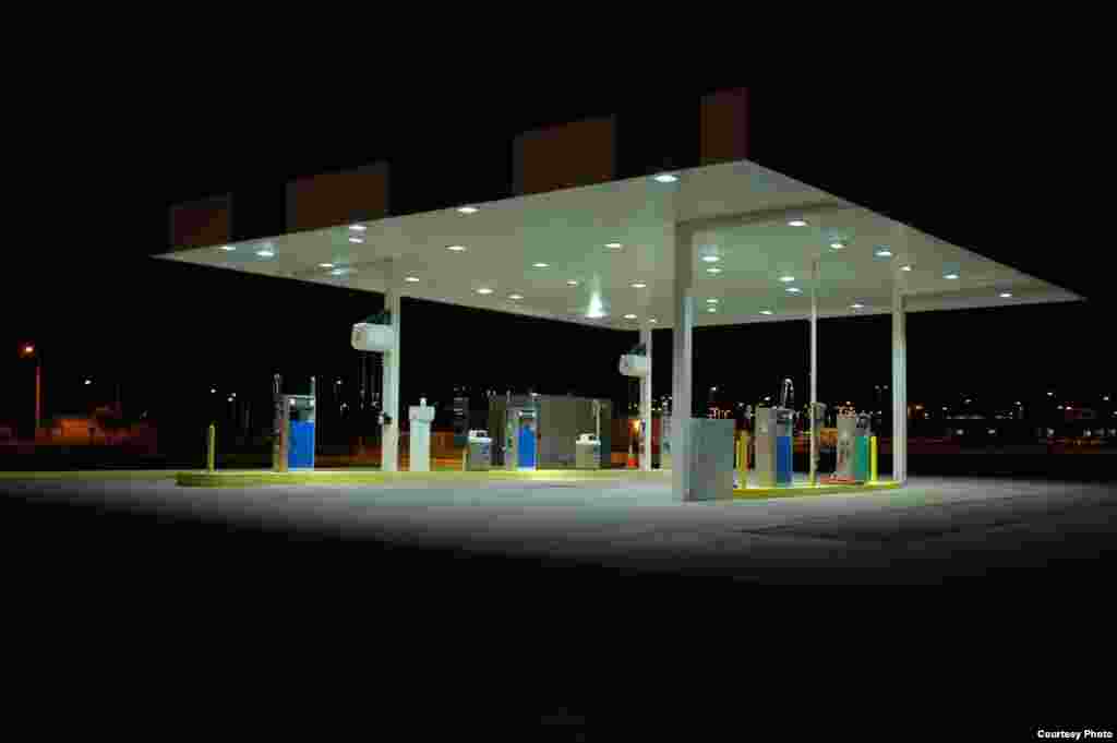 After a retrofit, the gas station&rsquo;s new shielded fixtures point down, creating enough light to see. (Pete Strasser, International Dark Sky Association)