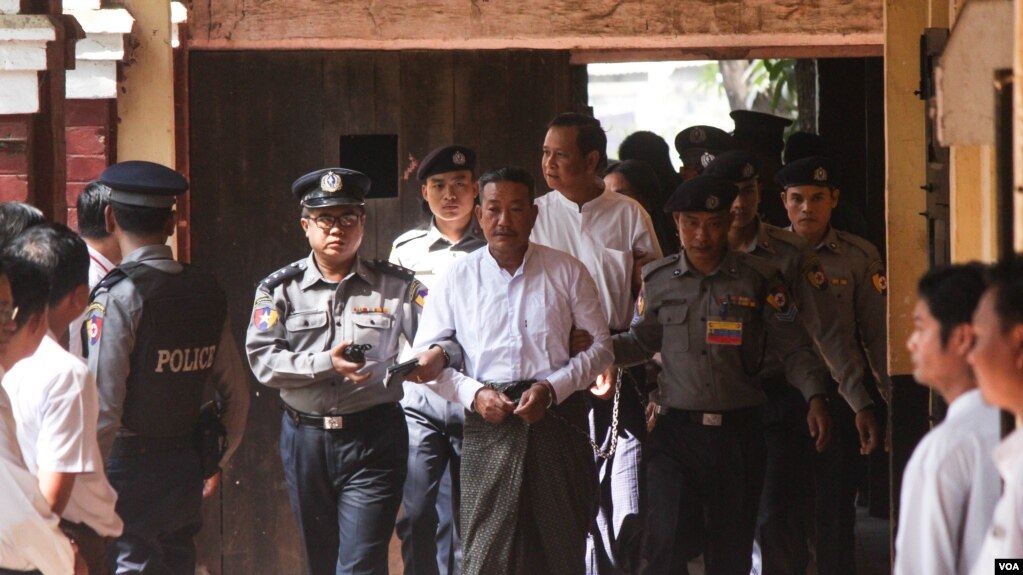 တရားလႊတ္ေတာ္ ဦးကိုနီလုပ္ႀကံခံရမႈအတြက္ ေသဒဏ္စီရင္ခ်က္ခ်ခံရသူ တရားခံၾကည္လင္းအား ရံုးထုတ္လာသည့္ျမင္ကြင္း။ (ေဖေဖာ္ဝါရီ ၁၅၊ ၂၀၁၉)
